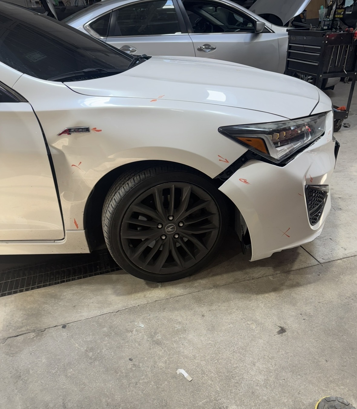 White Acura before repair