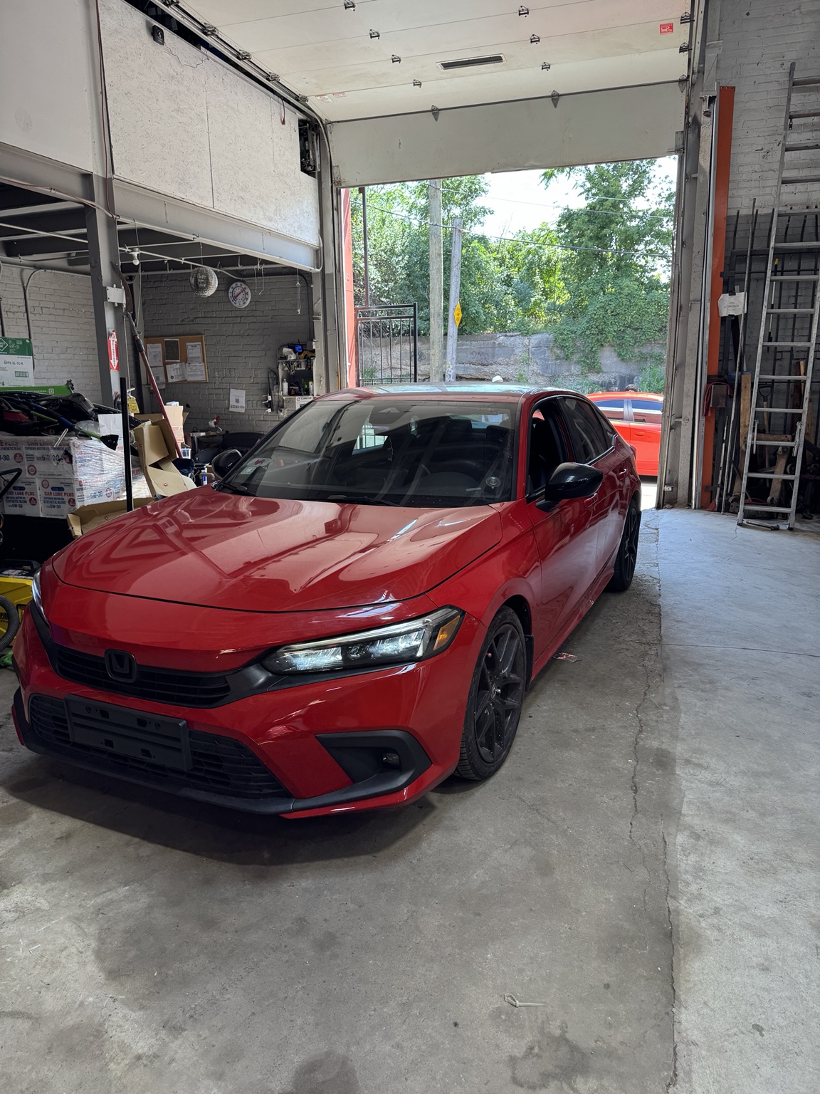 Red Honda after repair