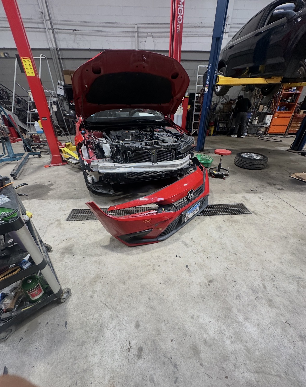 Red Honda before repair